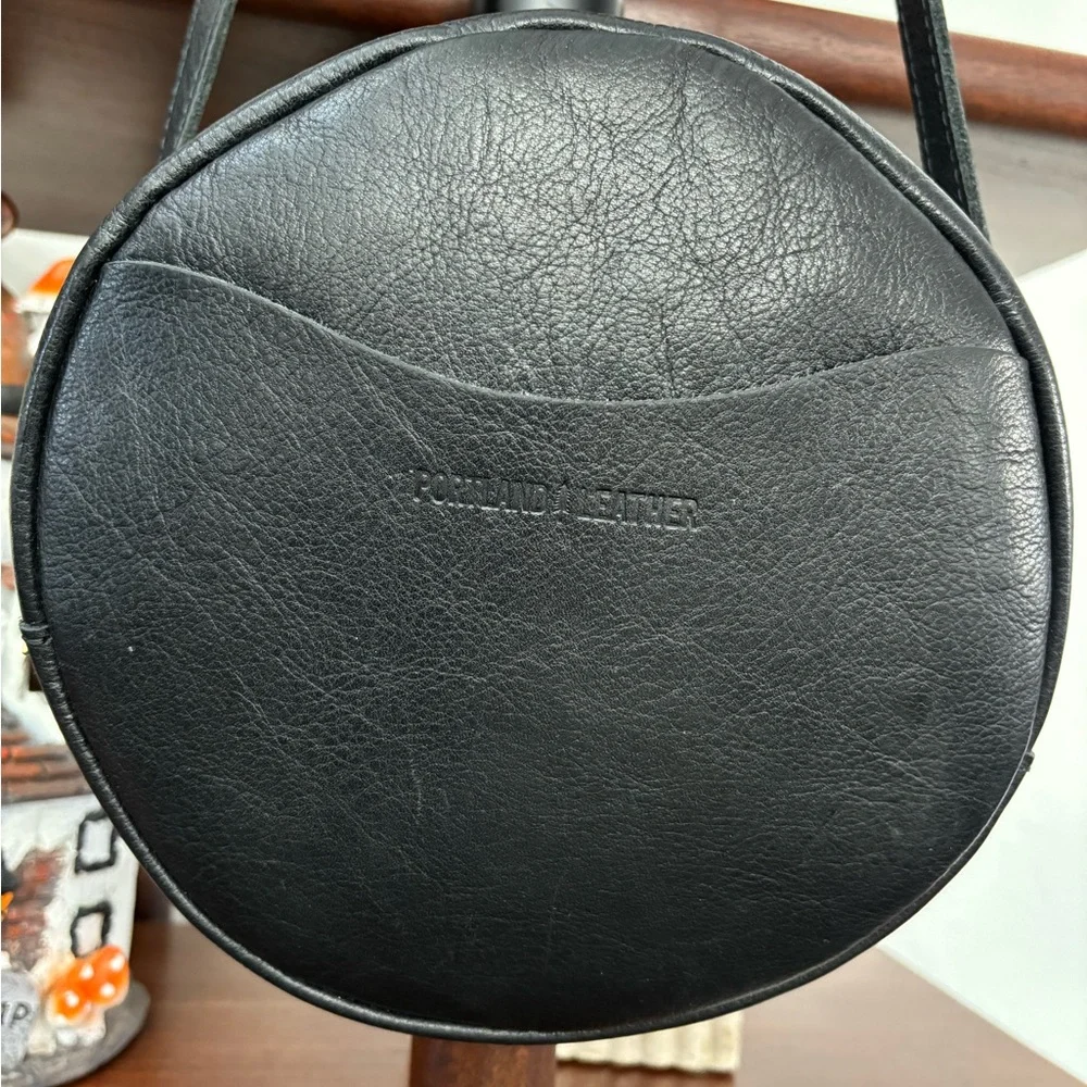 Portland Leather Round Black Crossbody Bag 
Large -Pebble Finish-Size 9 inches. - Picture 2 of 3